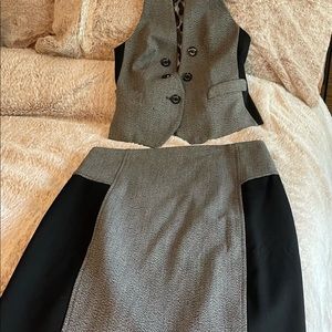 EXPRESS Brand two piece skirt and vest. Inside is lined with animal print